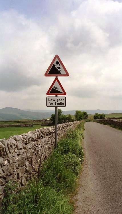 Beware, steep hill and falling rocks